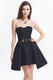 Klassisk ärmlös korsettklänning i svart blommigt mönster