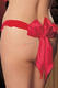Röd sexig stringtrosa med en rosett modell större